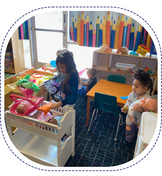 Two children playing with a toy in the room.